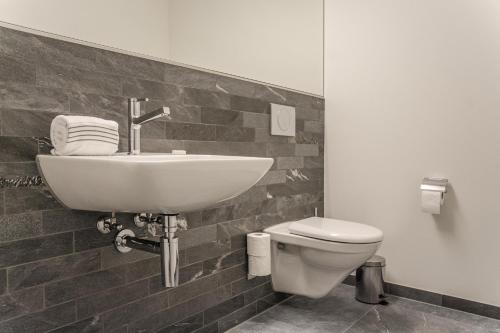 Koupelna v ubytování Apartment JungfrauCenter Roteflue - GRIWA RENT