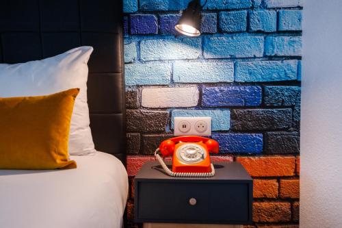 Chambre Quadruple avec 1 Lit Double et 2 Lits Simples
