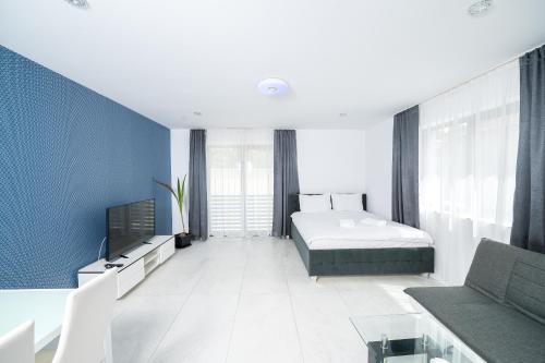 Ένα ή περισσότερα κρεβάτια σε δωμάτιο στο CONCEPT APARTMENTS