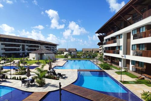 an image of the pool at the resort at Flat Cupe Beach Living in Porto De Galinhas
