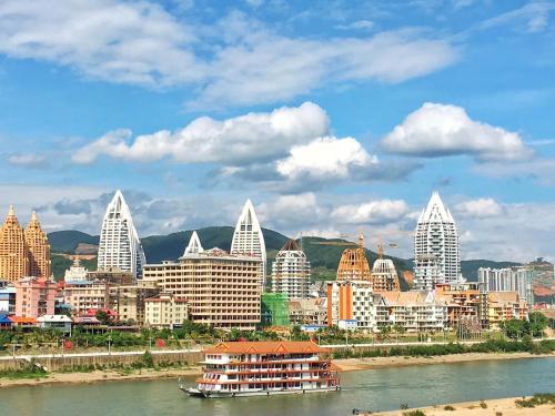 Γενική άποψη της πόλης Jinghong ή θέα της πόλης από  αυτό το ξενοδοχείο διαμερισμάτων