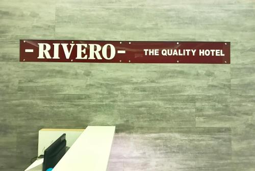 a sign that reads rivero istg istg istg istg istg istg istg istg istg istg at RIVERO BOUTIQUE HOTEL Seremban 2 in Seremban