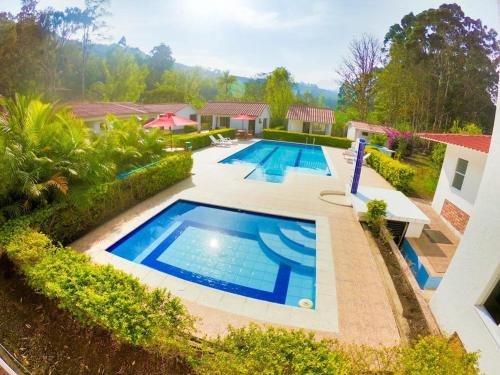 an overhead view of a swimming pool in a yard at FINCA EL RECUERDO in Gachetá