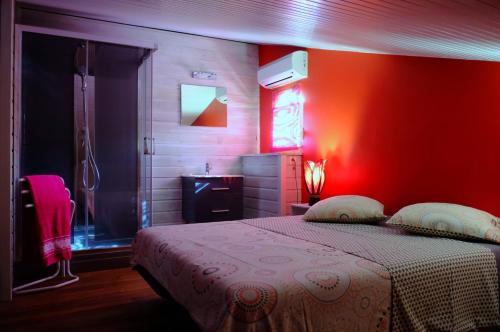 Postel nebo postele na pokoji v ubytování Habitation Diamant - Apparts & Spas