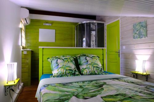 Postel nebo postele na pokoji v ubytování Habitation Diamant - Apparts & Spas