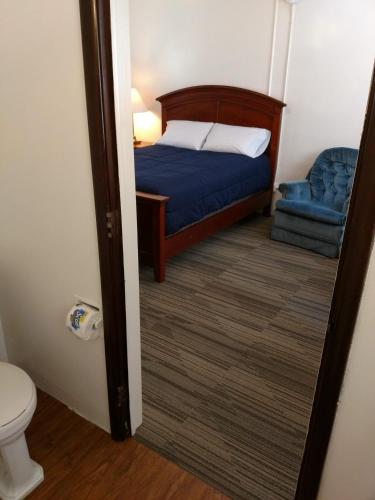 Ένα ή περισσότερα κρεβάτια σε δωμάτιο στο The Ohio Motel