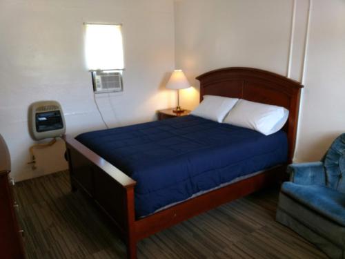 Ένα ή περισσότερα κρεβάτια σε δωμάτιο στο The Ohio Motel