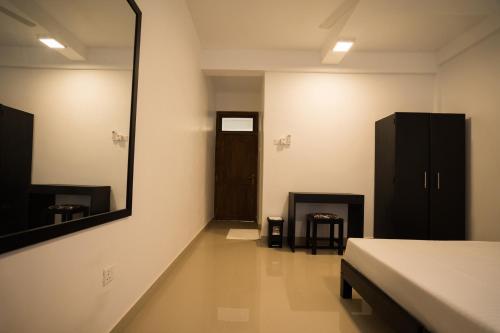 Televisyen dan/atau pusat hiburan di Kozy B&B