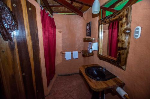 Ванная комната в Hotel La Costa de Papito
