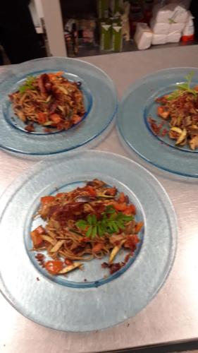 three plates of food sitting on a table at Hotel Margareth in Riccione
