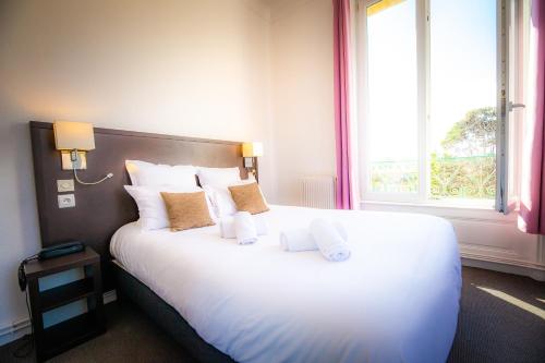 Letto o letti in una camera di La Villa Andry