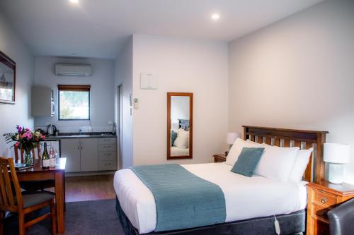 Katil atau katil-katil dalam bilik di Carrick Lodge Motel