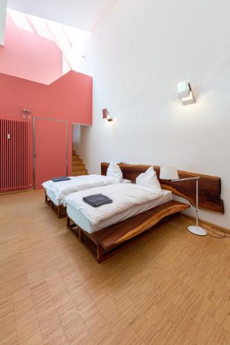 Katil atau katil-katil dalam bilik di Darmstadt Loft