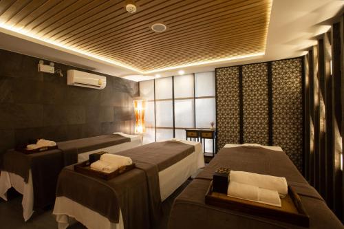 เตียงในห้องที่ Stay with Nimman Chiang Mai - SHA Extra Plus