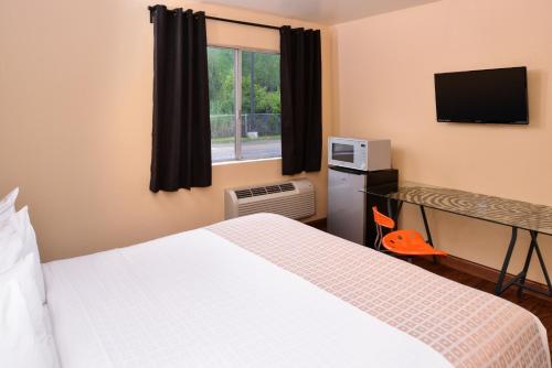 Ένα ή περισσότερα κρεβάτια σε δωμάτιο στο Valued Stay Madison