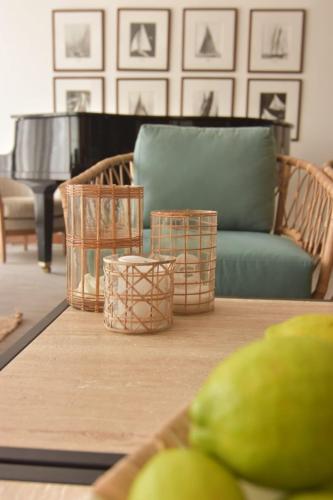 a living room with a couch and a table with apples at Marina Smir Hotel & Spa in M'diq