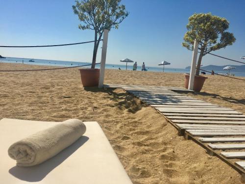 a rolled up towel on a sandy beach at Marina Smir Hotel & Spa in M'diq
