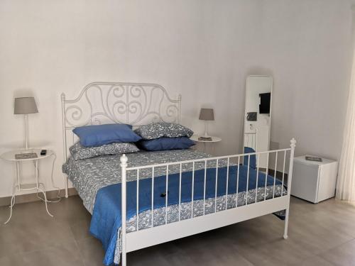 Postel nebo postele na pokoji v ubytování 58 Gradini di Girgenti