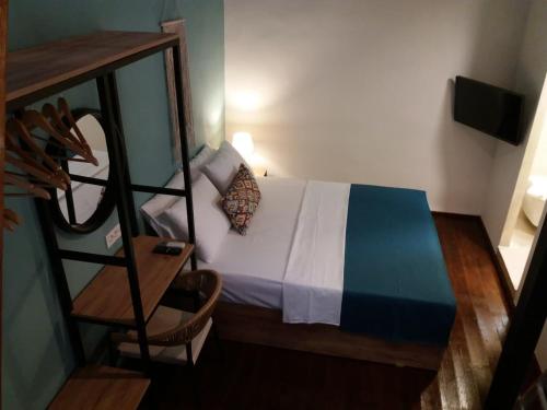 Postel nebo postele na pokoji v ubytování Fivos Residence