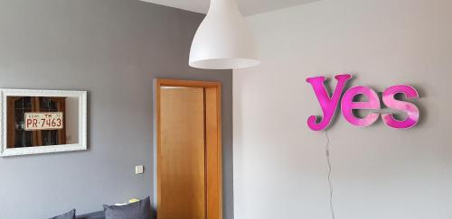 a room with a door and a sign that says yes at Art Apartment - Harz in Stolberg i. Harz