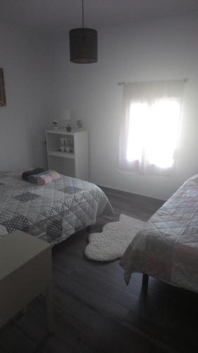 Postel nebo postele na pokoji v ubytování Maribella chambres à louer