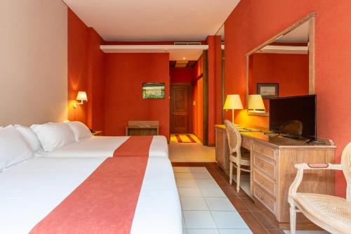 Katil atau katil-katil dalam bilik di Culture Hotel Villa Capodimonte