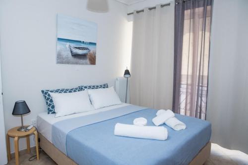 Ένα ή περισσότερα κρεβάτια σε δωμάτιο στο A beautifull 2nd floor apartment close to the Port