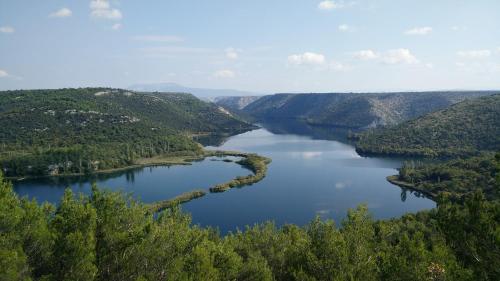 an aerial view of a lake in a valley at Šimun&Jakov in Drinovci