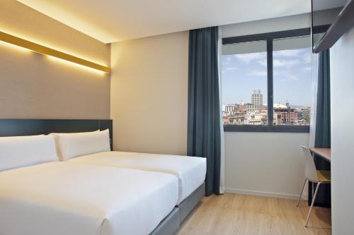 Letto o letti in una camera di Hotel Brick Barcelona