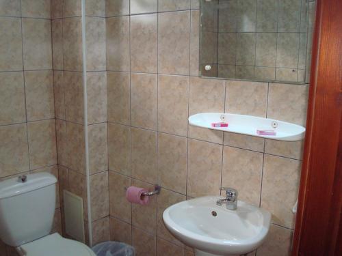Ванна кімната в Pensiunea Marc
