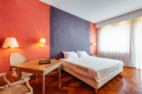 Katil atau katil-katil dalam bilik di Culture Hotel Villa Capodimonte