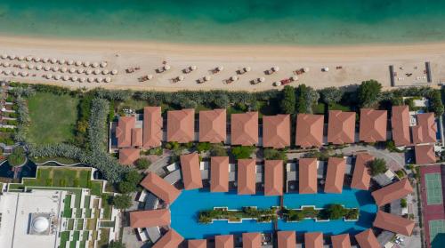 an overhead view of a beach with umbrellas at Jumeirah Zabeel Saray Dubai in Dubai
