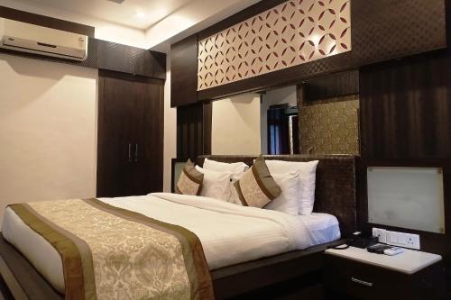 Krevet ili kreveti u jedinici u okviru objekta Hotel Surya International
