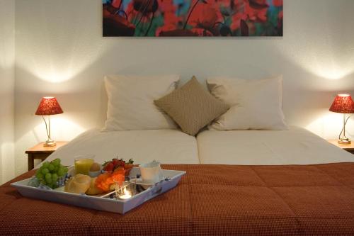 Een bed of bedden in een kamer bij Appartementen Valkenburg