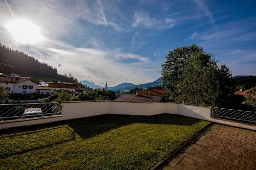a balcony with a view of the mountains at Leni´s Appartements in Fieberbrunn