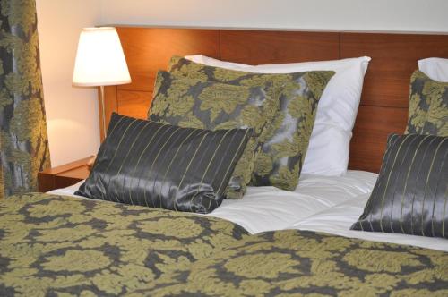 Cama o camas de una habitación en Quinta Rota d' Oliveira
