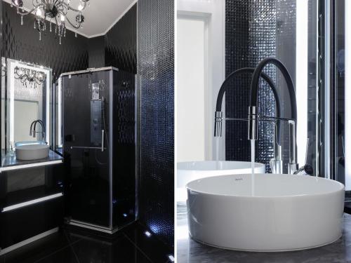 Ένα μπάνιο στο Black&White Apartment in Smart Plaza