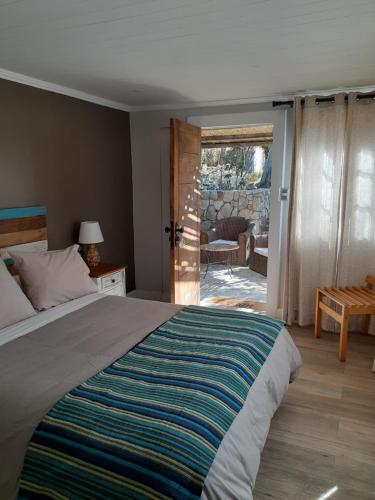 Voodi või voodid majutusasutuse Hotel El Milagro toas