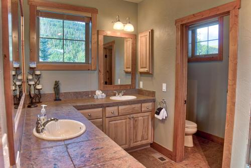 a bathroom with a sink and a mirror at 120 Rachel Lane in Breckenridge