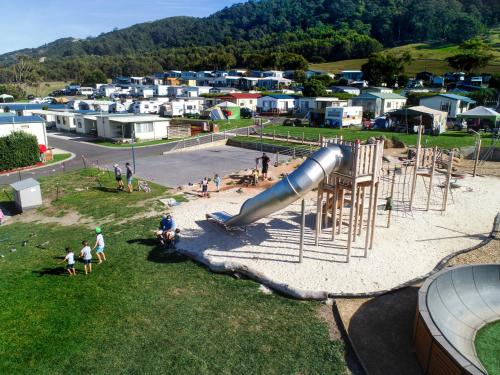 an aerial view of a playground with a slide at BIG4 Apollo Bay Pisces Holiday Park in Apollo Bay