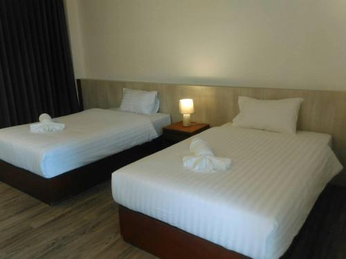 Postel nebo postele na pokoji v ubytování Must Come Boutique Hotel