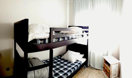 Postel nebo postele na pokoji v ubytování Piso Familiar en Llançà