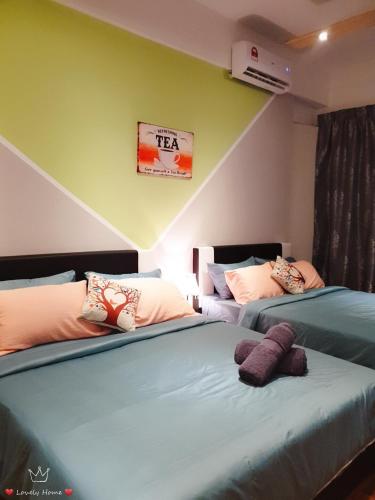 A bed or beds in a room at LovelyHome@Geo Linked BRT/Sunway/Medical 中文房东