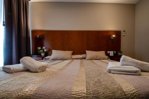 Ένα ή περισσότερα κρεβάτια σε δωμάτιο στο Hotel El Acebo