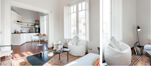 a white living room with white chairs and a table at Carolina's Nest in Trapani