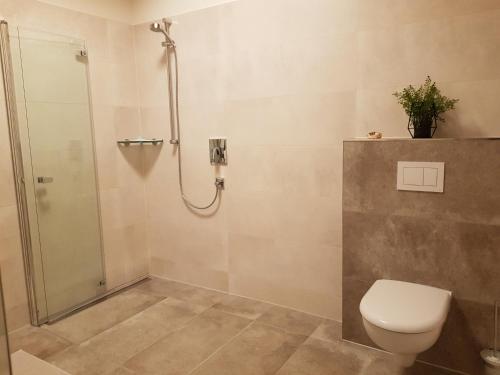 Ένα μπάνιο στο Ferienhaus Löh