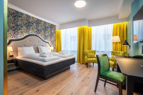 Postel nebo postele na pokoji v ubytování Thon Hotel Cecil