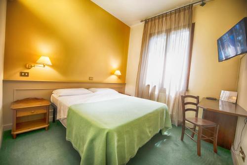 Katil atau katil-katil dalam bilik di Hotel Parco Fola