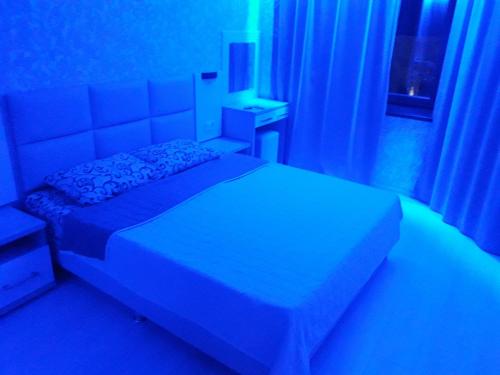 Postel nebo postele na pokoji v ubytování apart-hotel Sky