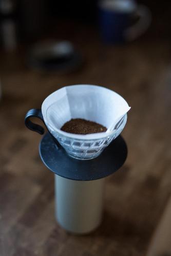 a coffee cup with a funnel on top of it at Lytte Hytte - Ferienhaus Wingst in Wingst